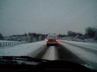Here we are in a queue of about twenty cars. "So what if it's slippy? GO FASTER!"