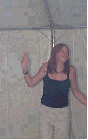 She is laughing.