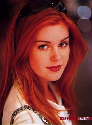 Oh my God. OH MY GOD! Restrain me! It's Isla Fisher, THE most gorgeous red-head in the world! Her, Pippa's kitchen table, Summer Bay High uniform. Ha. Oh God...