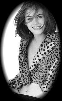 This is Liz Hurley. Hubba hubba, the masses say.