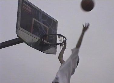 Although it looks like X is about to slam that alley-oop in the hole, he has actually just missed a dunk. Now bear in mind that he's standing ON A CAR. Some people, no skills...